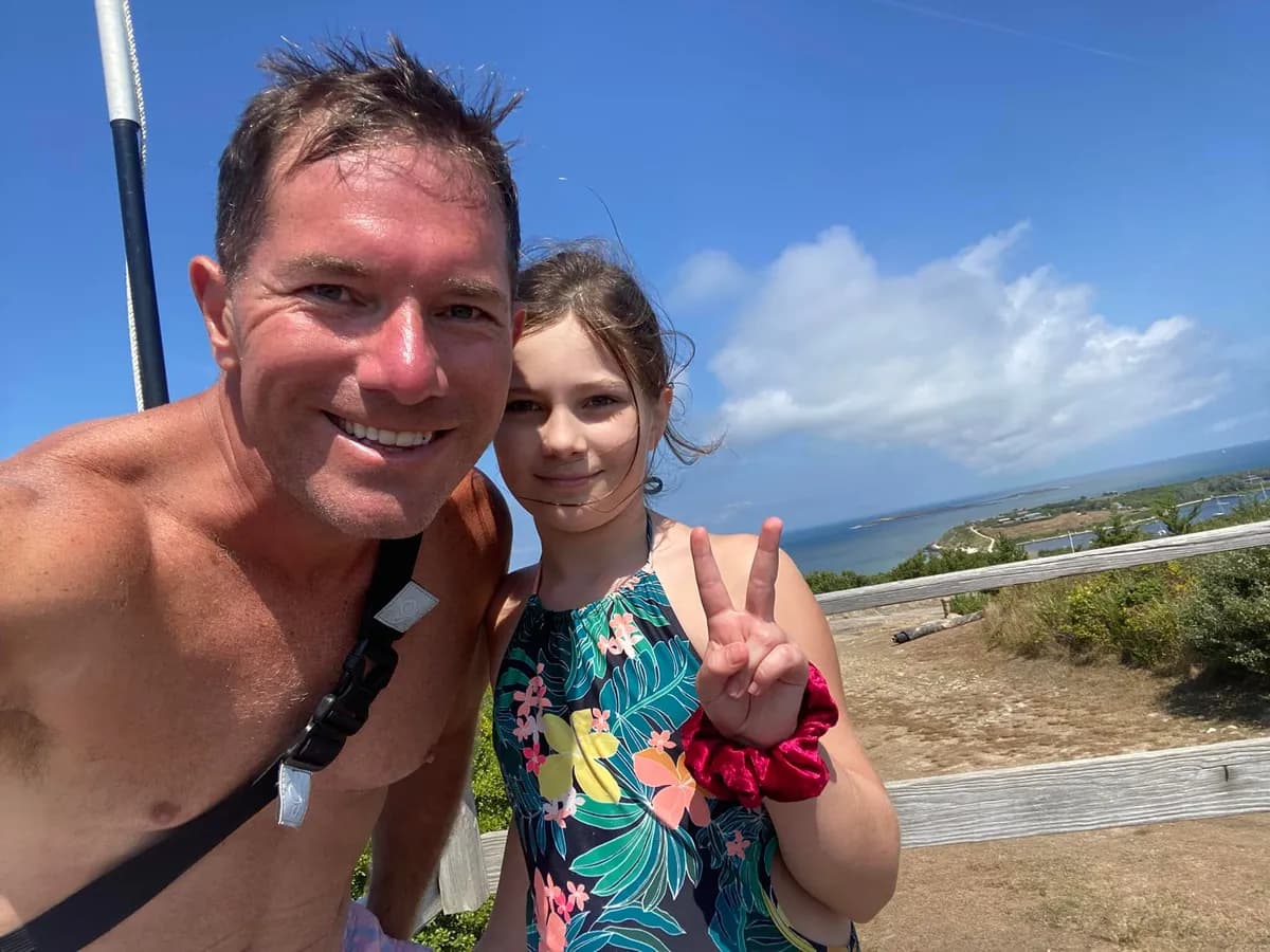 Father and daughter at the harbor